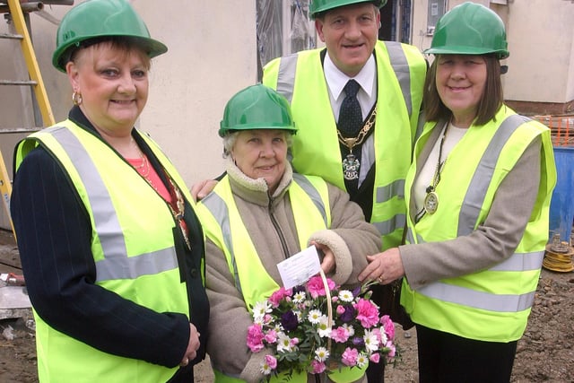 2007: Eastwood Mayor Sue Bagshaw, Broxtowe Mayor Doug Wilcockson and wife Valerie, with Sylvia Doy, first tenant at Plumptre Gardens eco homes.