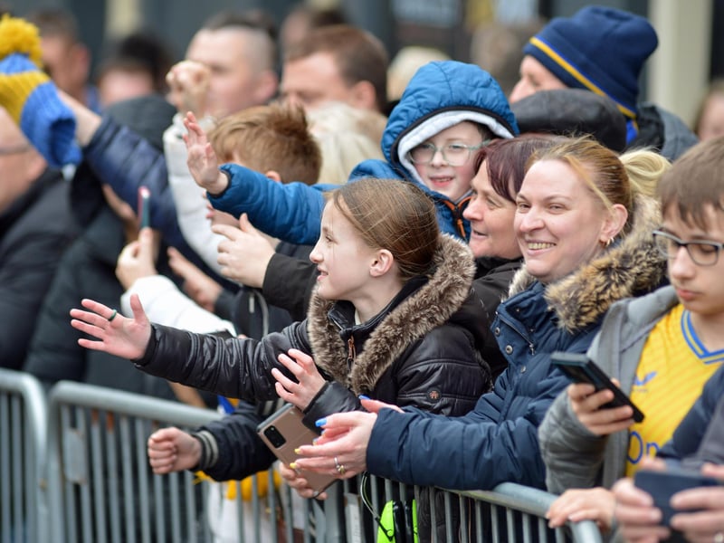 Crowds packed into Mansfield town centre this afternoon to salute their heroes.