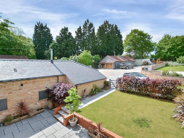 This aerial shot gives you a good idea of how the barn conversion sits within the Debdale Lane landscape.