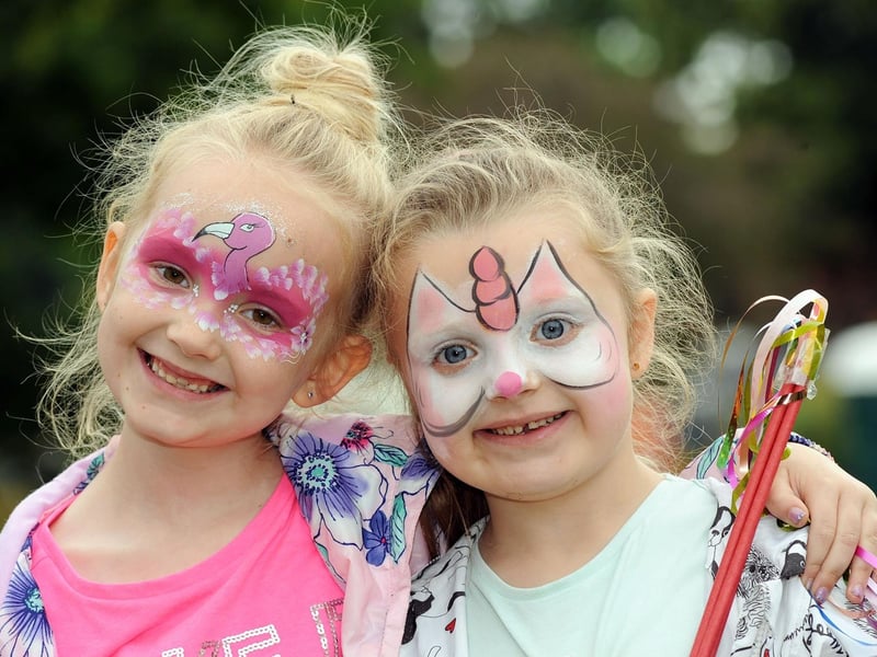 Macie Hull, 7, and her pal Isabella Marshall, 6, show off their face paintings which they got at a fun day on Carr Bank Park.