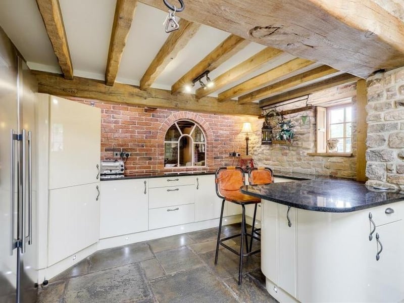 A breakfast bar is a nice touch within the kitchen, which also has space for a fridge freezer. Appliances include an integrated oven, ,microwave, induction hob, extractor fan and dishwasher.