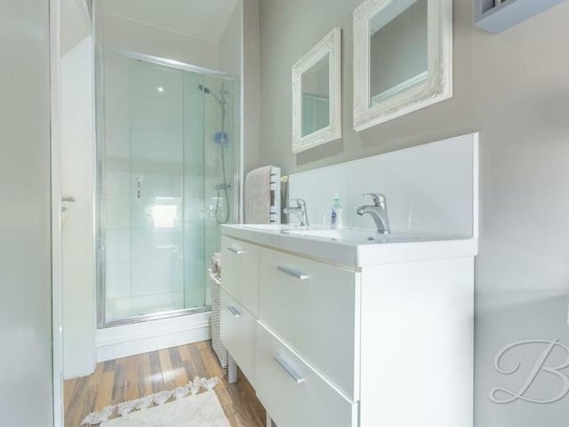The first en suite from a different angle, showing its shower cubicle.