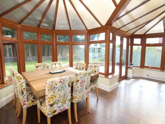 Next to the kitchen is this bright and spacious conservatory, which is currently being used as the family dining room. But it could be converted into a play room or a home office. It can be utilised all year round because it has three radiatrors for winter use.