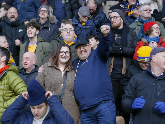 Travelling Stags fans watch the Sky Bet League 2 match against Bradford City.