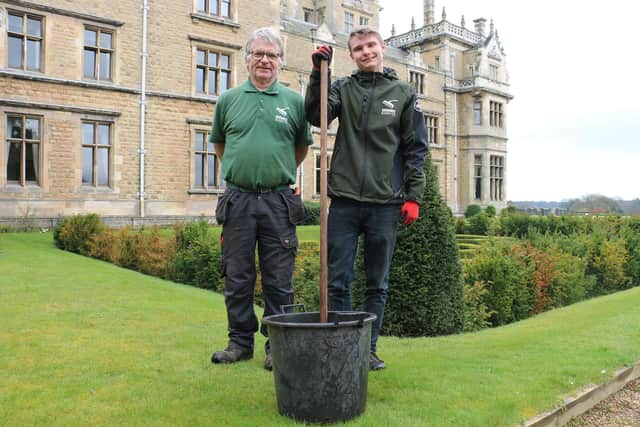 Aeron Buxton (right) gets to grips with weeding, hoeing and pruning on the estate with head gardener Paul Jevon (left).