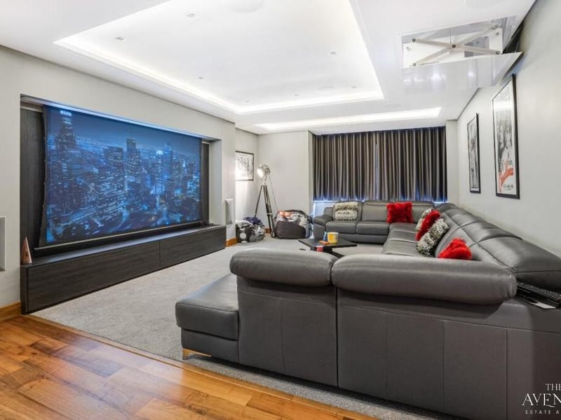 The stunning cinema room is kitted out with surround sound, ceiling speakers and remote-controlled projector, curtains and lighting. Grab your popcorn and catch up with the latest blockbuster movie!