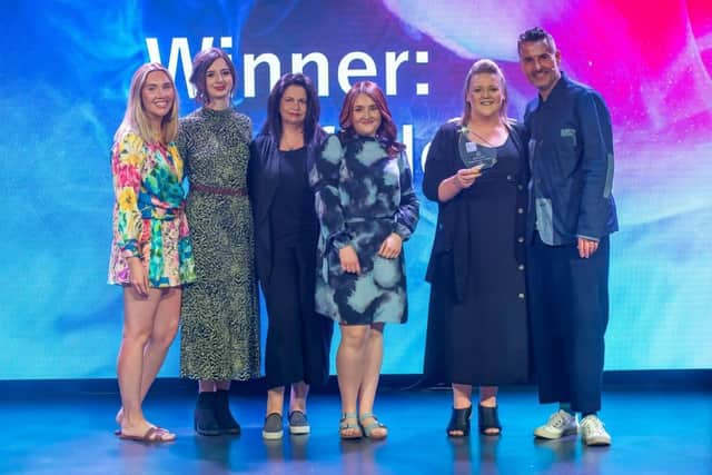 KH Hair Mansfield receiving their award.