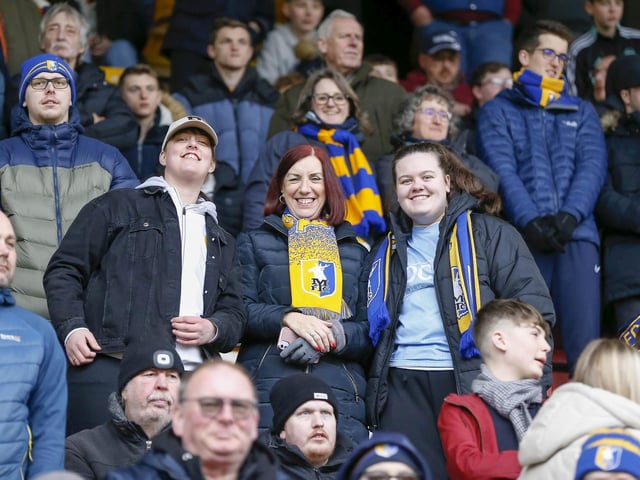 Travelling Stags fans watch the Sky Bet League 2 match against Bradford City.