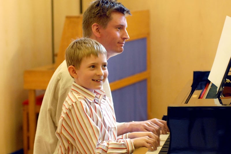 James left and David Cooke perform a duet at the 2008 Mansfield Music and Drama Festival