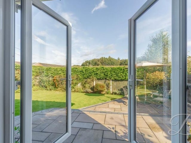 And here is the view of the garden from the dining room once you swing open those French doors.