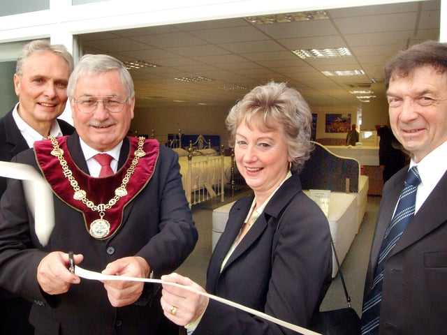 Mansfield District Council chairman Coun Barry Answer (as of 2007) cut the ribbon to officially open the new extended showroom on Mansfield Woodhouse's Old Mill Lane Industrial Estate. Also pictured are from left; Managing Director John Hibbert, Mrs Denise Answer and salesman Peter Burt.