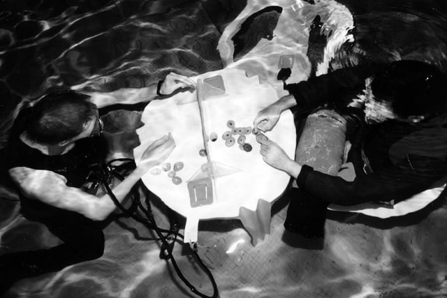 Divers from Portsmouth university subaqua club take part in the 24 hour underwater connect four tournament at the Pyramids centre in November 1994. The News PP5300