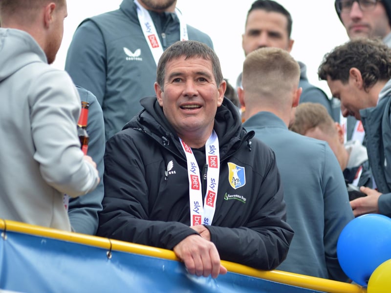 Manager Nigel Clough takes it all in.