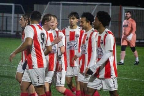Eastwood celebrate their midweek winner against Grantham. Photo by Scott Messom.