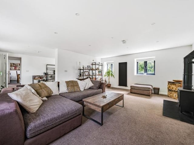 The first stop on our tour of the £500,000 Annesley Woodhouse cottage is the main reception room, which is this spacious living room. It has a cosy atmosphere.