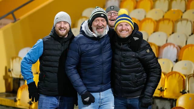 Mansfield Town's faces in the crowd against Swindon Town.