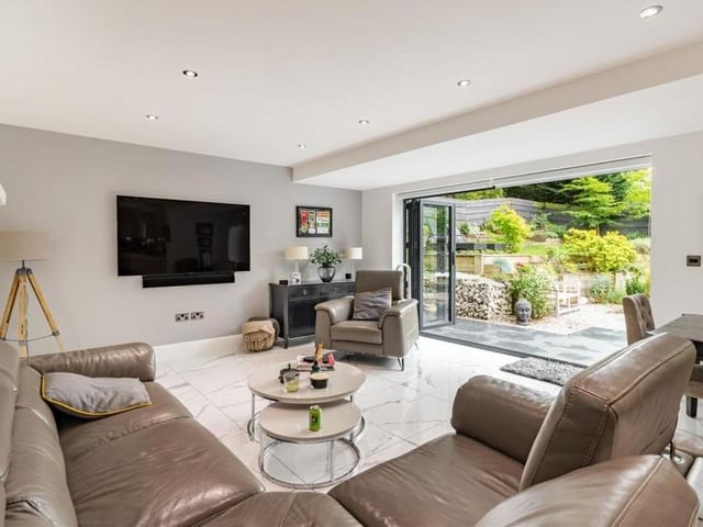 Spectacular views of the back garden are guaranteed from the open-plan living area. Imagine a lazy summer weekend!