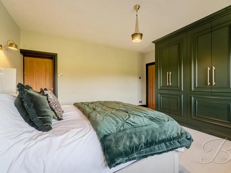 One of five spacious bedrooms in the family property.