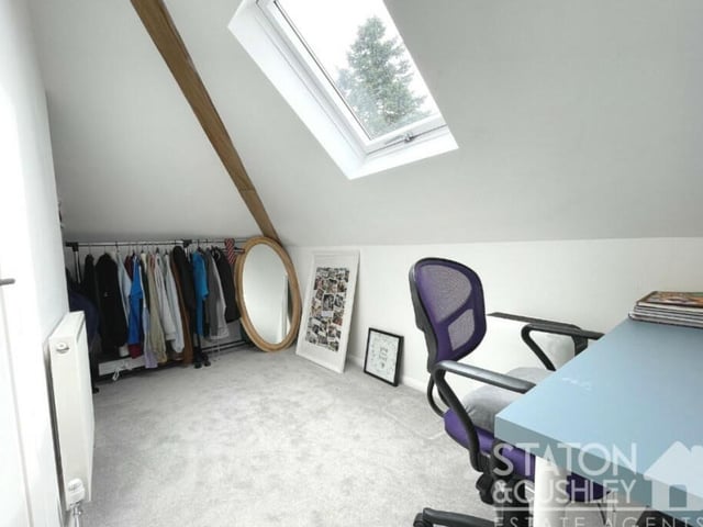 One of the first-floor bedrooms has its own dressing room, with space also for a desk, or dressing table, and chairs.
