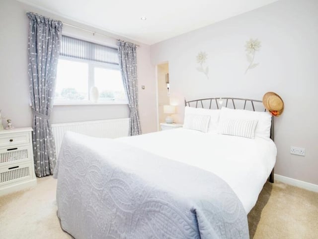 Here is the first of the double bedrooms at the £300,000 Coultons Avenue bungalow. It has access to an en suite.