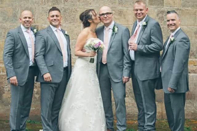 Friends supporting Adam, and wife Petra, at his wedding. Now they are supporting him again in his fight for life.