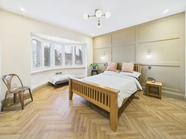 One of four spacious bedrooms in the property.