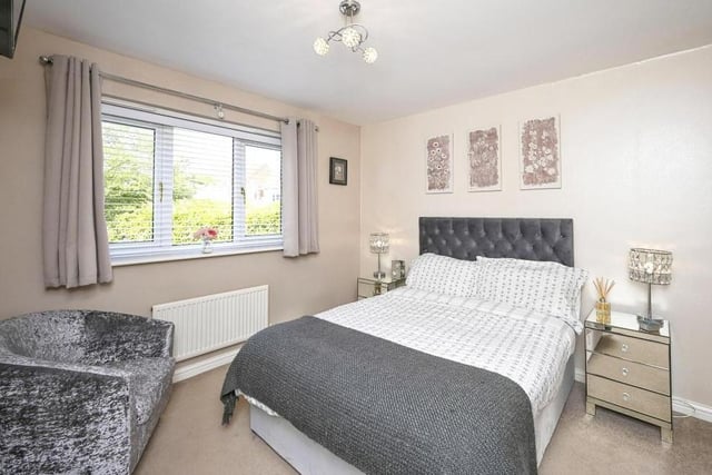 Delightful decor makes the third bedroom stand out. You can gaze at the back garden from its window.