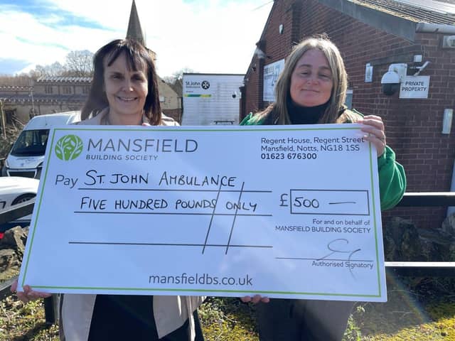 Mandy Whitten, from Mansfield Building Society, presents £500 to Alison Cook, of St John Ambulance. Picture: Mansfield Building Society