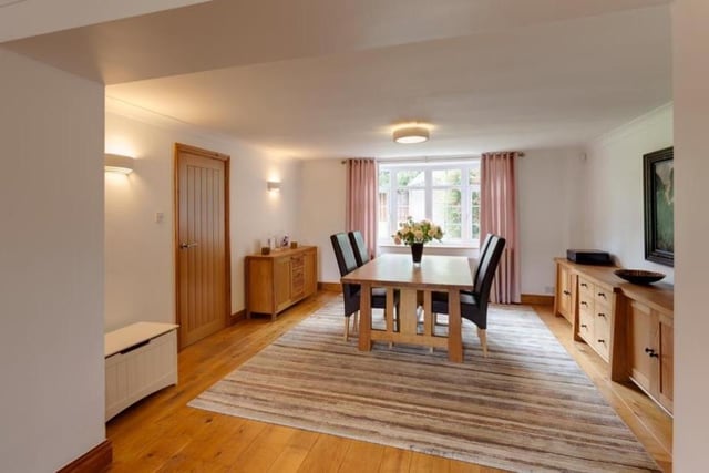 The dining room at the Heath property is a lovely space for family meals. Facing the back of the house, it boasts an oak wood floor, coved ceiling, flush light point, wall-mounted light points, TV/aerial point and telephone point. An oak door opens to the inner hall.