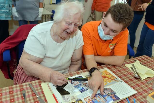 Alex working with Thelma St.Annes on a reminisce excercise.