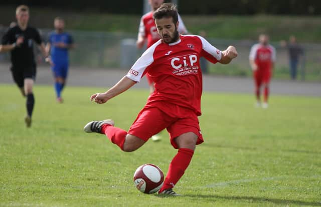Lynton Karkach in FA Cup action for AFC against Stourport Swifts. Pic by Peter Craggs