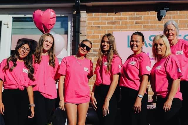 Lashes HQ opening in 2022. From left to right. Volunteer Charlie, Giselle, Nieve, Amelie, Emma (Evie's mum), Bev and Diane - treasurer of The Lashes Foundation.