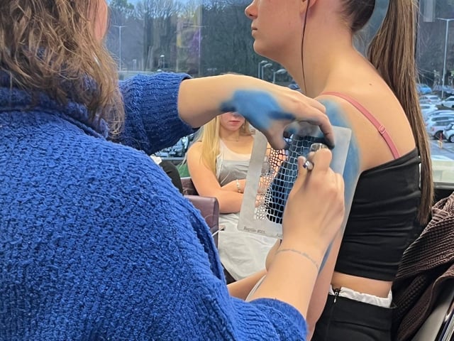 Emma and the students worked with airbrushing colours onto the skin