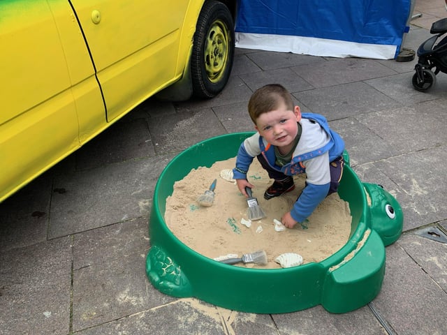 Two-year-old Logan enjoyed digging for fossils.