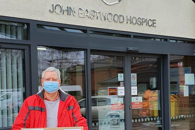 Christopher Hill with the masks donated to the hospice and care homes