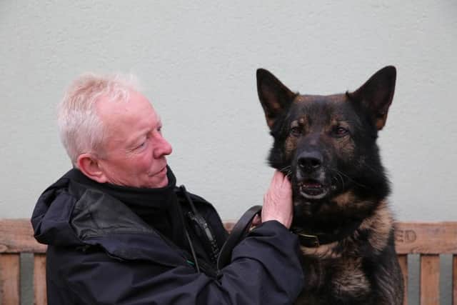 Razor with his former handler PC Stu Hazard..