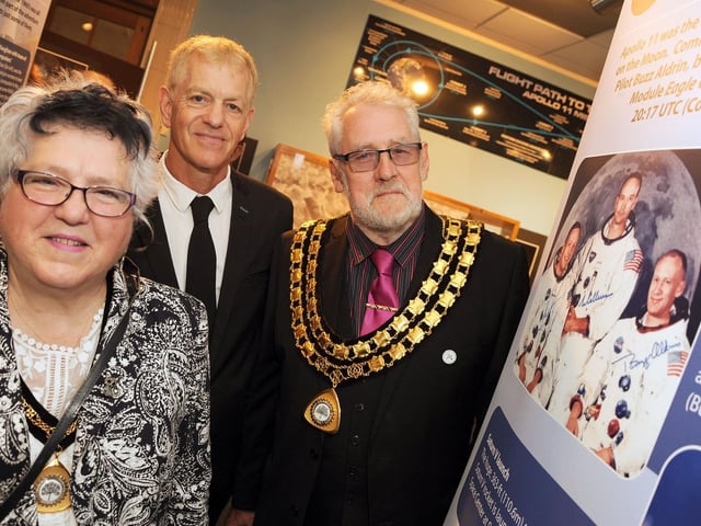 Man on the Moon - a 50th Anniversary Celebration at Mansfield Museum. Mansfield and Sutton Astronomical Society chairman Rob Dawes, welcomes the chairman of Ashfield District Council Coun. Tony Brewer and Mrs Patricia Percival to their exhibition marking 50 years since the moon landing in 2019.
