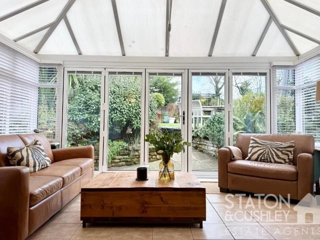 Complete with underfloor heating and impressive bi-folding doors opening directly onto the expansive rear gardens, this delightful room offers the perfect setting to relax and unwind throughout the year.