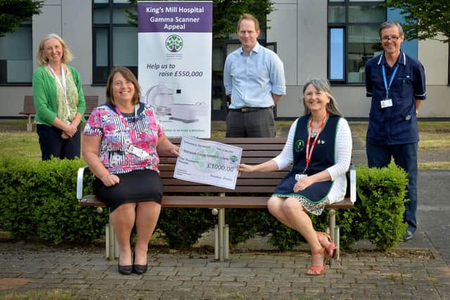 Elaine Torr accepting the final donation to the Gamma Scanner Appeal from Voluntary Services Chair, Jill Smallwood on behalf of Voluntary Services. (L to R) Sue Geary, Consultant Radiologist, Elaine Torr, Divisional General Manager in Diagnostics and Outpatients, Robin Smith, Head of Communications, Jill Smallwood, Voluntary Services Chair and Rob Bradley, Nuclear Medicine Specialist.