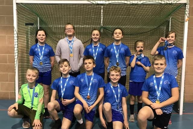The year five and six handball team at Mapplewells Primary.