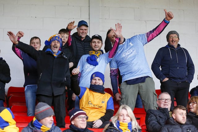 Stags fans watch the Sky Bet League 2 match against Walsall FC at the Bank's Stadium.