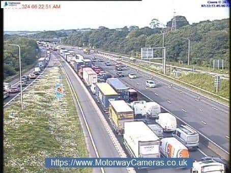 Long queues have formed due to the closure of the M1 southbound this morning Photo: Motorway cameras