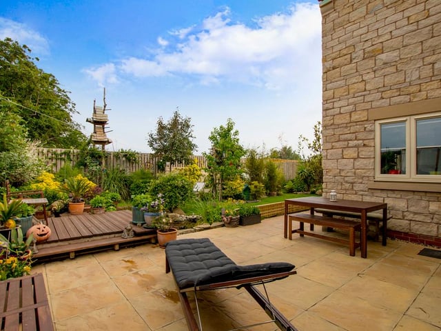 The garden has a great patio for entertaining.