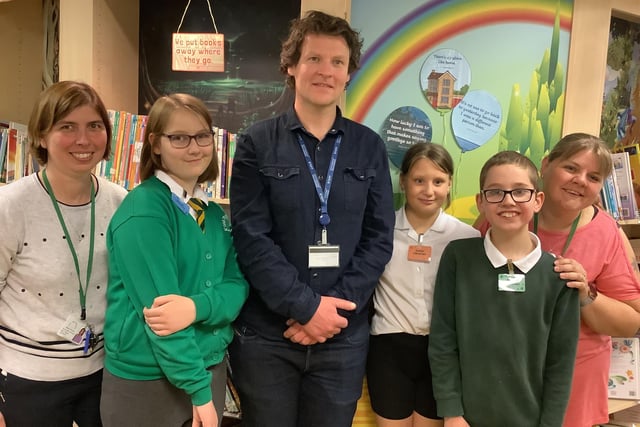 Luke Parmenter, widening access and outreach manager, at Notts Trent University pictured with staff and pupils from Oak Tree Primary and Nursery School