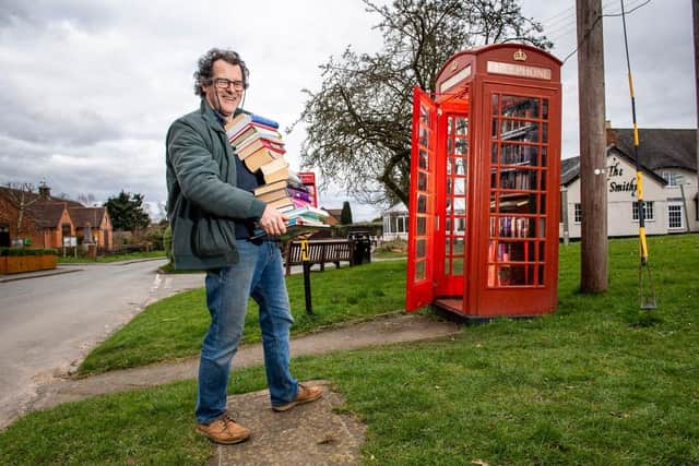 A telephone box, which has been transformed into a free book exchange in Warwickshire as part of the telecom company's Adopt a Kiosk scheme.