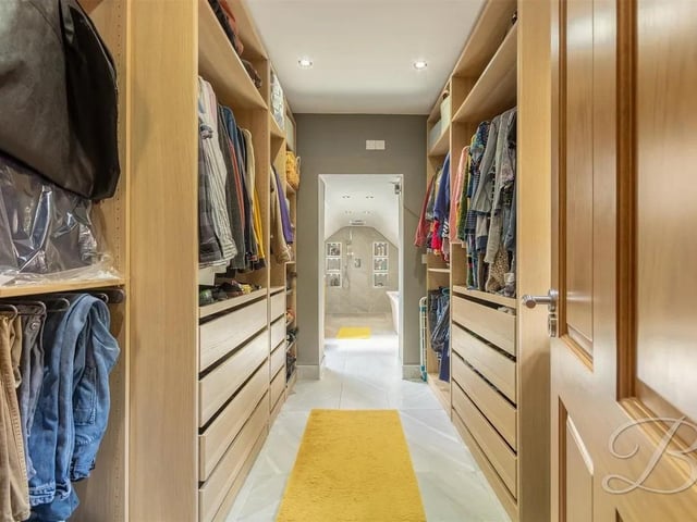 The spacious walk-in wardrobe is perfect for storage.