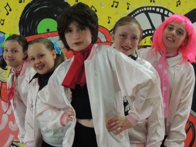 Young performers from Kimberley School presenting Grease in 2019.