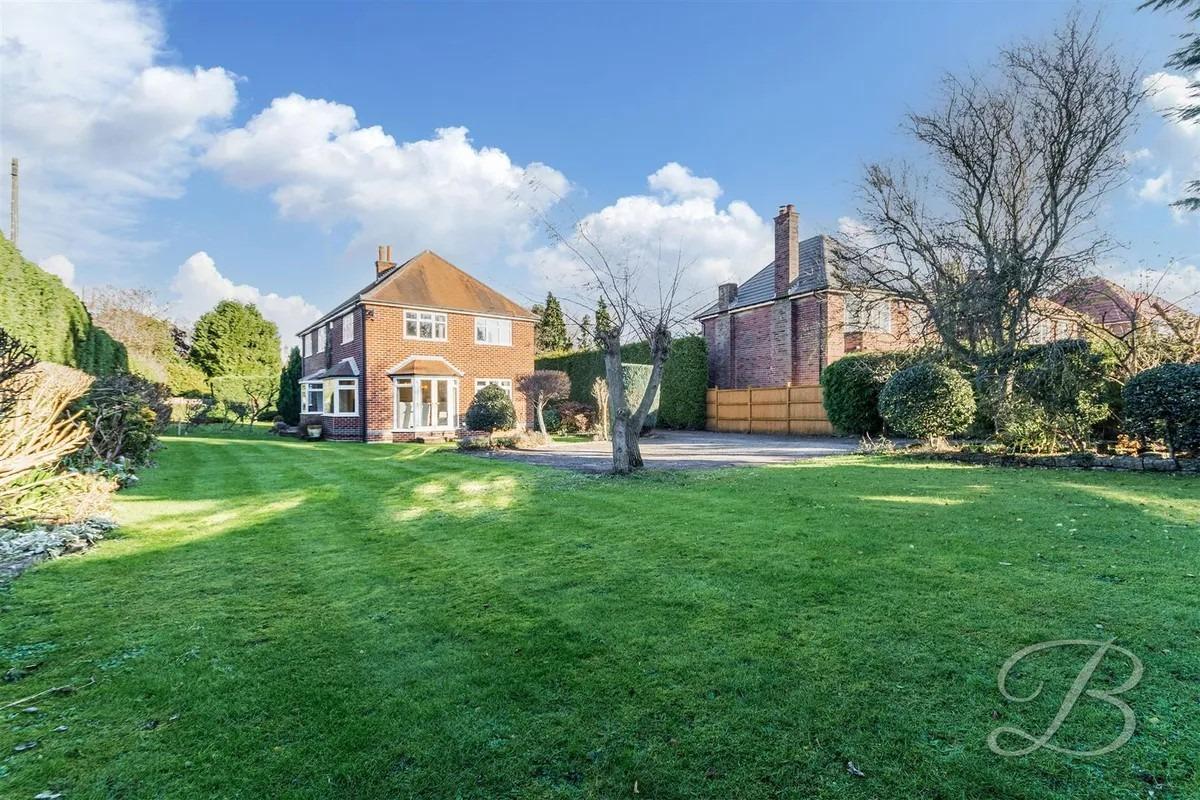Heading outside, you'll be met with approximately third of an acre of perfectly maintained garden including a lawn and patio.
