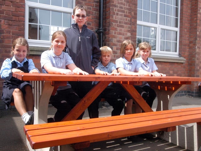 Keiron Downs, third left, who has donated a bench to Eastlands School at Meden Vale pictured with the bench and some of the other pupils in 2006. Other pupils pictured from the left are; Cloe Deakin, Hannah Parker, Danny Gibson, Molly Quinn and Katie Quinn.