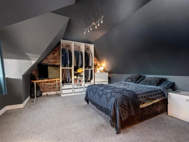 The second bedroom is a spacious double, with LED spotlights to the ceiling and a window facing the front of the house.